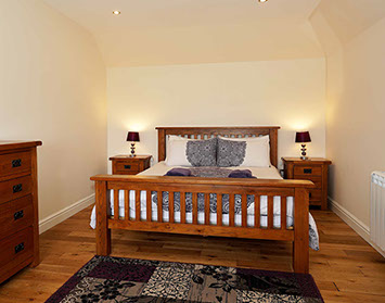 Culla Self Catering Cottage King Size Double Bedroom is spacious and modern with central heating and WIFI Internet Access