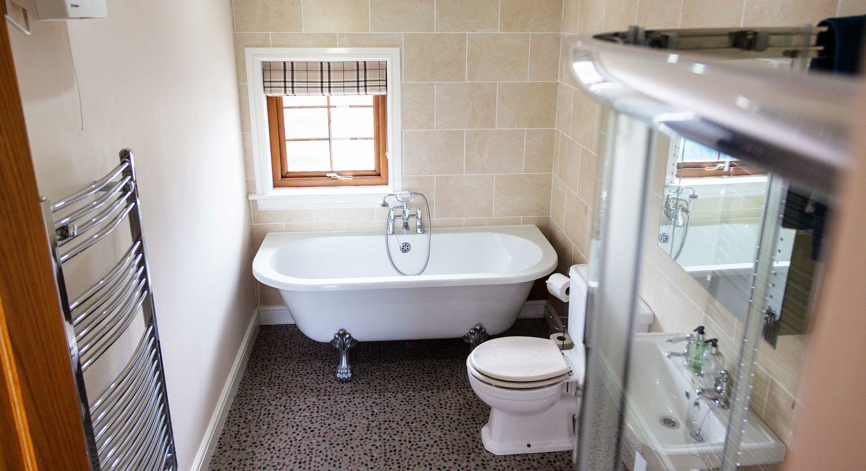 Our Self Catering Cottage contains a spacious modern Bathroom with bath Shower and Elecric Mirror